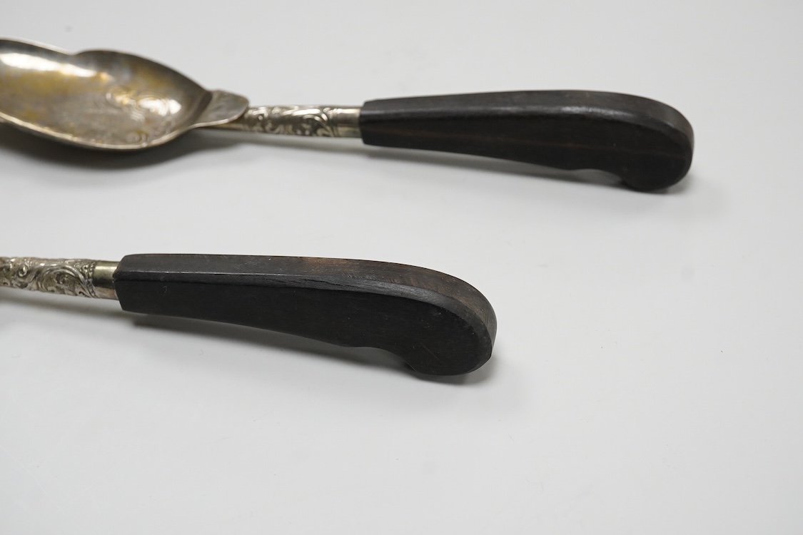 A collection of silver and white metal items, to include a cigarette box, a/f, a German dwarf candlestick, a cased spoon and pusher, etc.